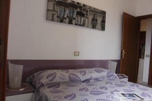 Posteľ alebo postele v izbe v ubytovaní Casa della Chicca