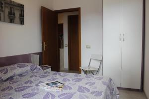 Posteľ alebo postele v izbe v ubytovaní Casa della Chicca