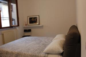 Ліжко або ліжка в номері Casa della Chicca