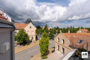 Budova, kde se aparthotel nachází