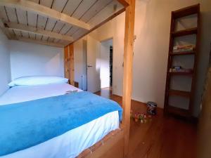 Łóżko lub łóżka w pokoju w obiekcie MONELLS - CASA Rural - CAN FELIP