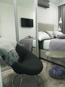 Postel nebo postele na pokoji v ubytování Apartmani Vidoš + 37 fotografií
