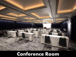 a conference room with white tables and chairs at THE LIVELY HAKATA FUKUOKA - Vacation STAY 82642 in Fukuoka