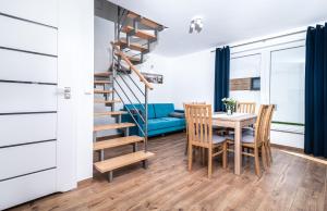Posedenie v ubytovaní Apartamenty Rodzinne Słoneczny Zakątek + 37 fotografií