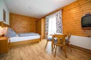 Voodi või voodid majutusasutuse Ferienhaus Nickl toas