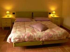 A bed or beds in a room at Thalassa Locanda B&B e appartamento