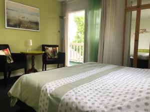 Postel nebo postele na pokoji v ubytování Bed & Breakfast "Bij Lucie"