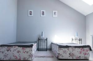 Łóżko lub łóżka w pokoju w obiekcie Apartament pod Morwą