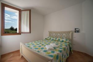 Llit o llits en una habitació de Villa Gaia