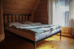 Posteľ alebo postele v izbe v ubytovaní Swistowka
