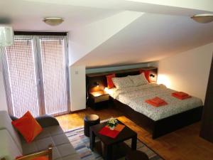 Postel nebo postele na pokoji v ubytování Apartmani Tamara