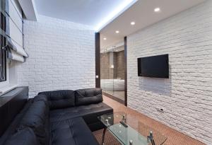 TV o dispositivi per l'intrattenimento presso Centrum Sobe Rooms Čačak