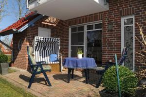 Zahrada ubytování Exklusive FeWo Greetsiel + 1 fotografie