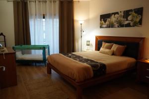 A bed or beds in a room at Machado Santos - T1 Apartment