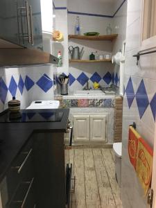 Kuchyňa alebo kuchynka v ubytovaní Casa del Mercado