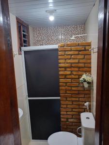 Phòng tắm tại Pousada Recanto das Fontes