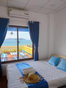 Katil atau katil-katil dalam bilik di Sunbay Homestay Cu Lao Cham