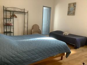 Postel nebo postele na pokoji v ubytování Le Papillon De Soie