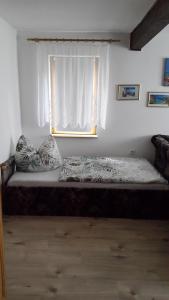 Postel nebo postele na pokoji v ubytování Ferienwohnung Schlothauer 1