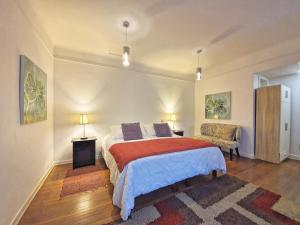 Cama ou camas em um quarto em Hostal Boutique Casa La Barca