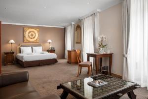 Letto o letti in una camera di Hotel Le Rive