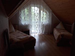 Postel nebo postele na pokoji v ubytování Над Вичов