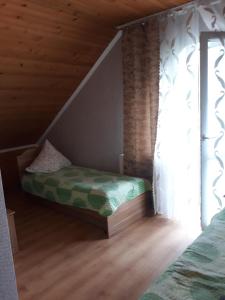 Postel nebo postele na pokoji v ubytování Над Вичов