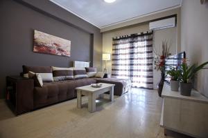 Posedenie v ubytovaní C.L.A. City Loux Apartment
