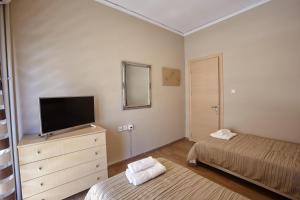 Posteľ alebo postele v izbe v ubytovaní C.L.A. City Loux Apartment