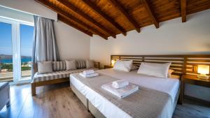 Posteľ alebo postele v izbe v ubytovaní Lofos Village Chania