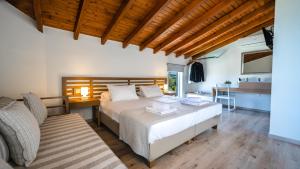 Posteľ alebo postele v izbe v ubytovaní Lofos Village Chania