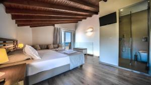 Posteľ alebo postele v izbe v ubytovaní Lofos Village Chania