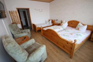 Postel nebo postele na pokoji v ubytování Hotel Charlott
