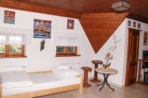 Postel nebo postele na pokoji v ubytování apartmán u Vágnera