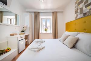 Postel nebo postele na pokoji v ubytování Luxury rooms Zadar old town