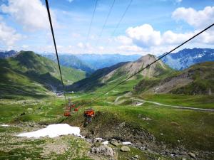 a gondola ride in the mountains on a hill at Piz Ot in Samnaun +67 photos