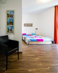 Ένα ή περισσότερα κρεβάτια σε δωμάτιο στο Sobe Argo Izola