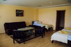 Posteľ alebo postele v izbe v ubytovaní Hotel Gołuń