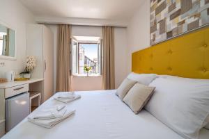 Postel nebo postele na pokoji v ubytování Luxury rooms Zadar old town