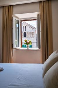 Postel nebo postele na pokoji v ubytování Luxury rooms Zadar old town