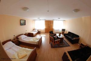 Posteľ alebo postele v izbe v ubytovaní Hotel Gołuń
