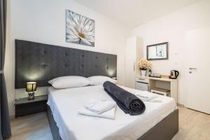 Postel nebo postele na pokoji v ubytování Luxury rooms Zadar old town