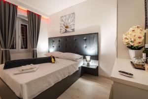 Postel nebo postele na pokoji v ubytování Luxury rooms Zadar old town