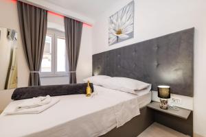 Postel nebo postele na pokoji v ubytování Luxury rooms Zadar old town