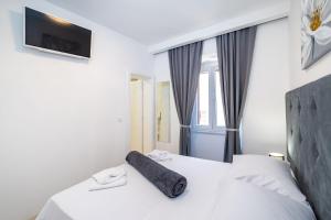 Postel nebo postele na pokoji v ubytování Luxury rooms Zadar old town