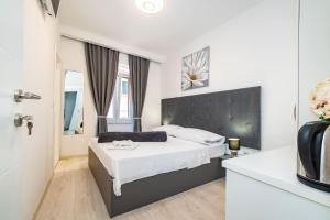 Postel nebo postele na pokoji v ubytování Luxury rooms Zadar old town
