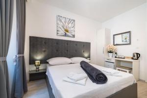 Postel nebo postele na pokoji v ubytování Luxury rooms Zadar old town