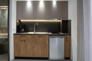Η κουζίνα ή μικρή κουζίνα στο Sea View Apartment Grek Nea 3
