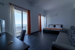 Postel nebo postele na pokoji v ubytování Hotel Cosmos