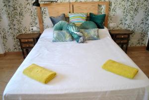 Postel nebo postele na pokoji v ubytování Lindo y acogedor Apartamento Grao Playa Gandia piso 5to sin ascensor